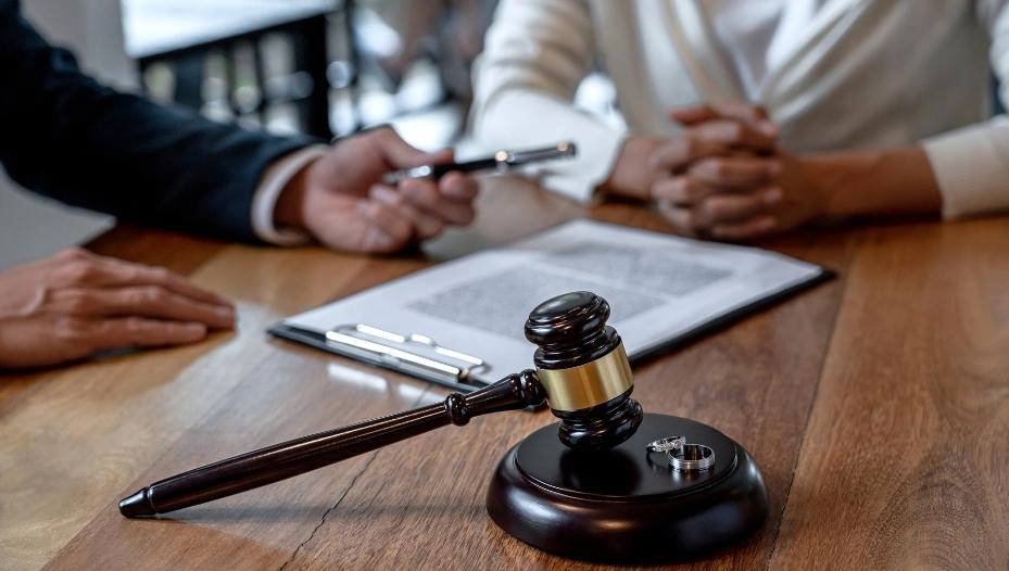 image of a person handing a pen to client with judge tools fishers in